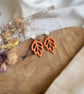 Autumn Minimalist Cutout Metallic Orange Polymer Clay Leaf Earrings - Image 6