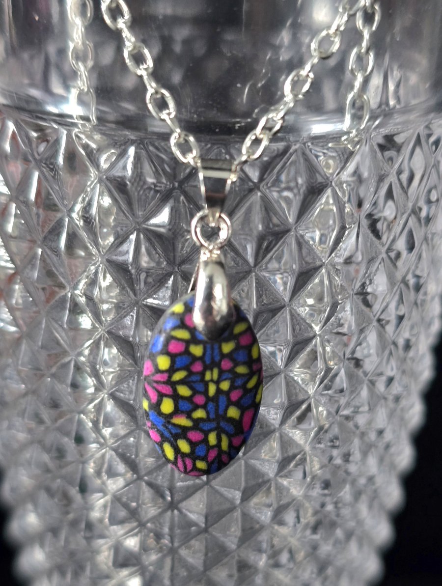 Polymer clay stained glass inspired drop oval necklace on a silver plated chain