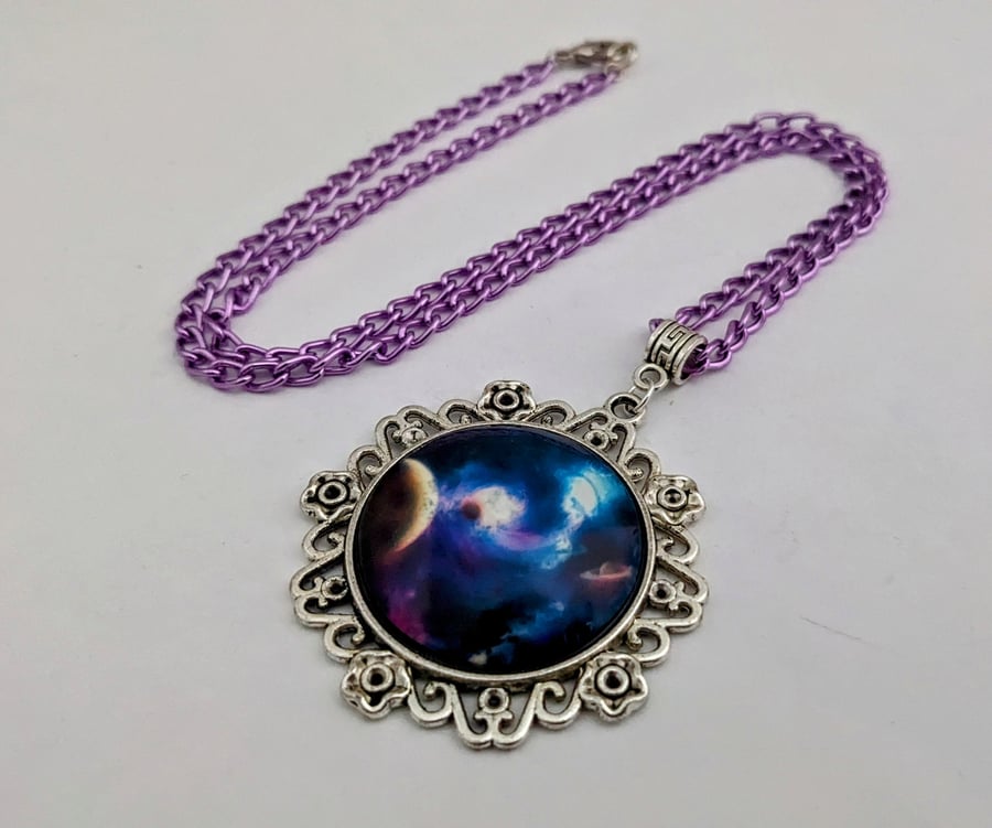Cosmos pendant on purple chain