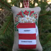 Personalised red and white stripy jug decoration filled with festive spices