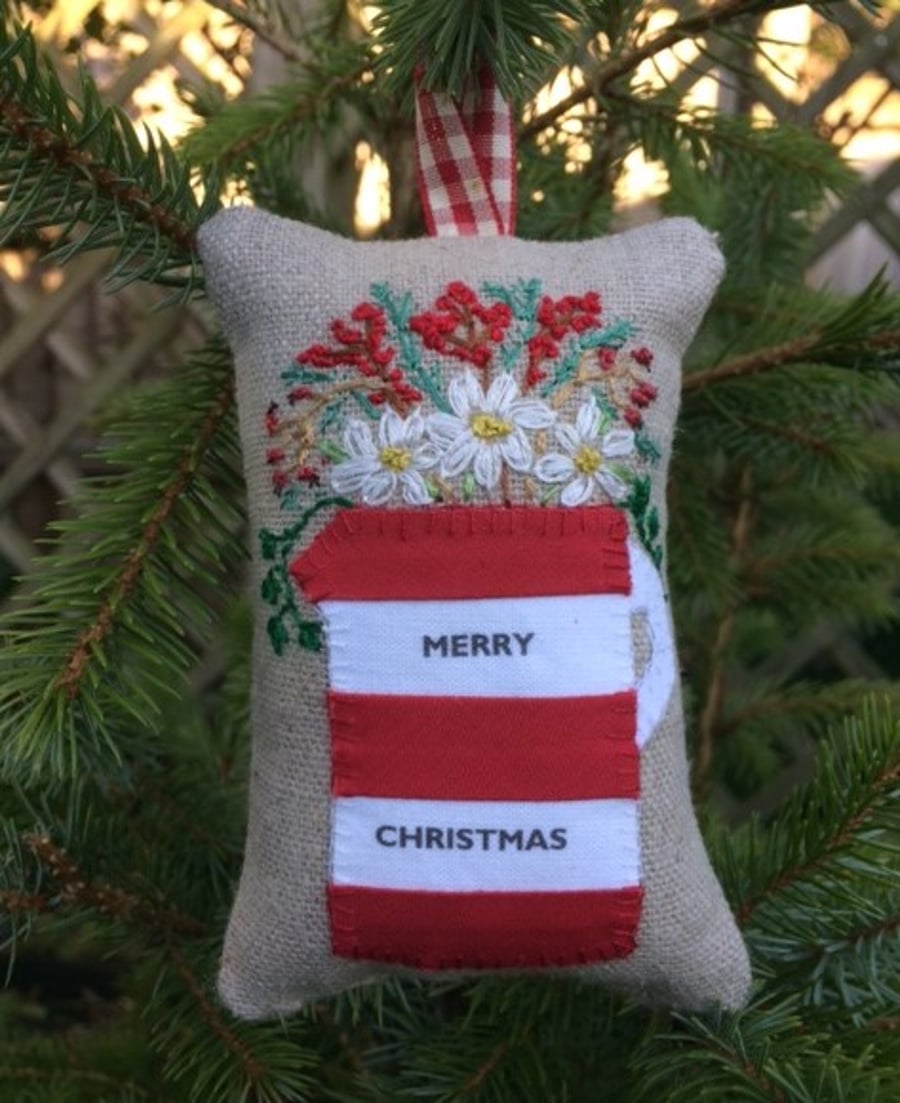 Personalised red and white stripy jug decoration filled with festive spices