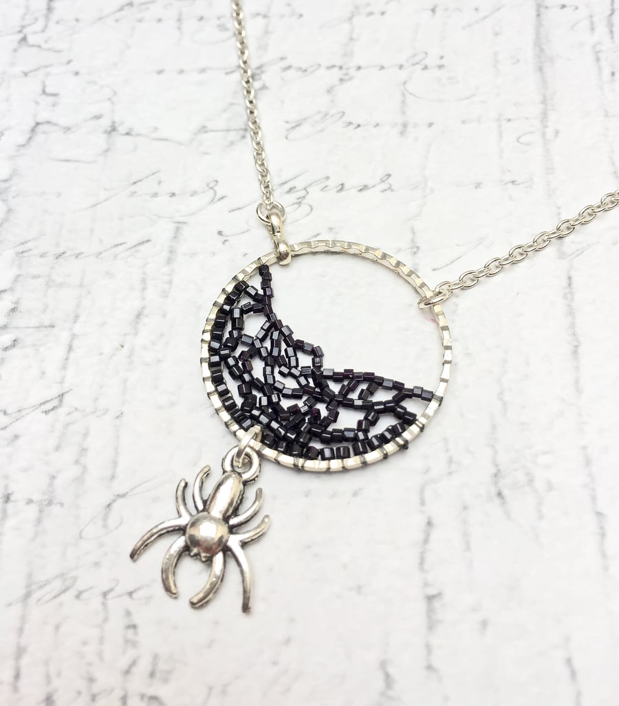 Beaded black cobweb pendant with spider charm Halloween Gothic inspired