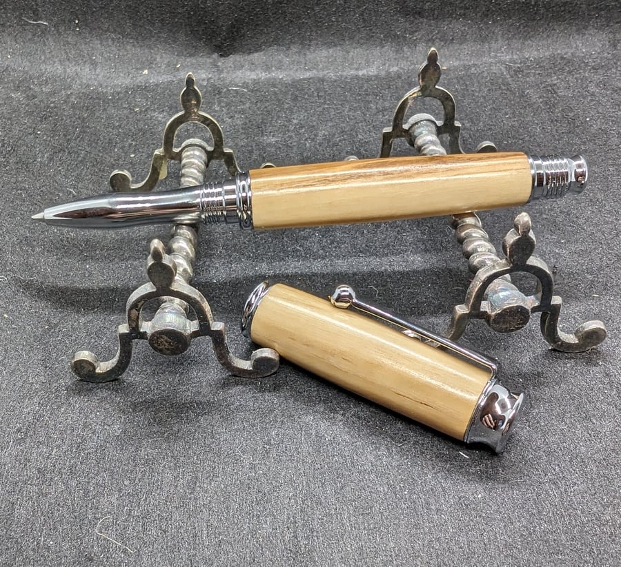 A rollerball pen in olive wood