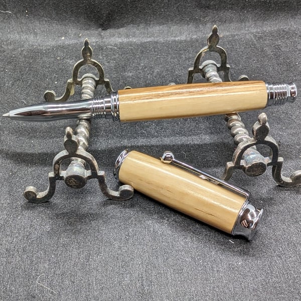 A rollerball pen in olive wood
