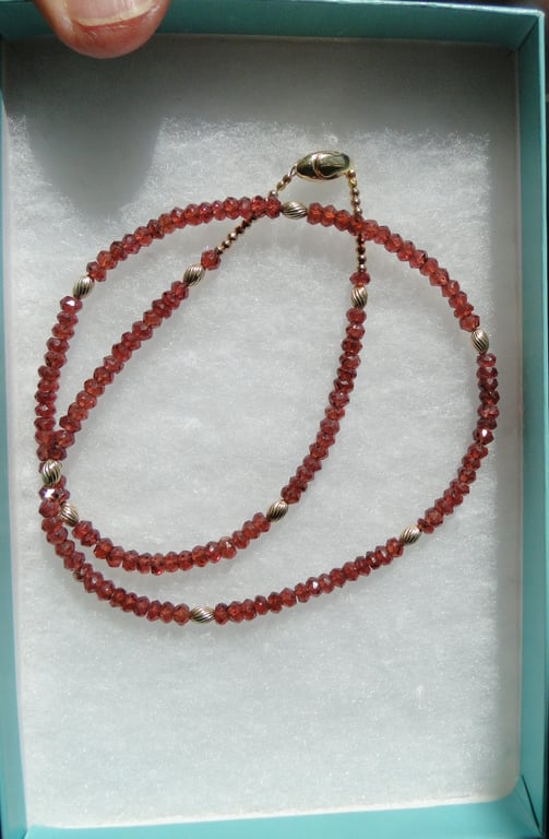 Red garnet gemstone and gold bead necklace.    Statement jewellery