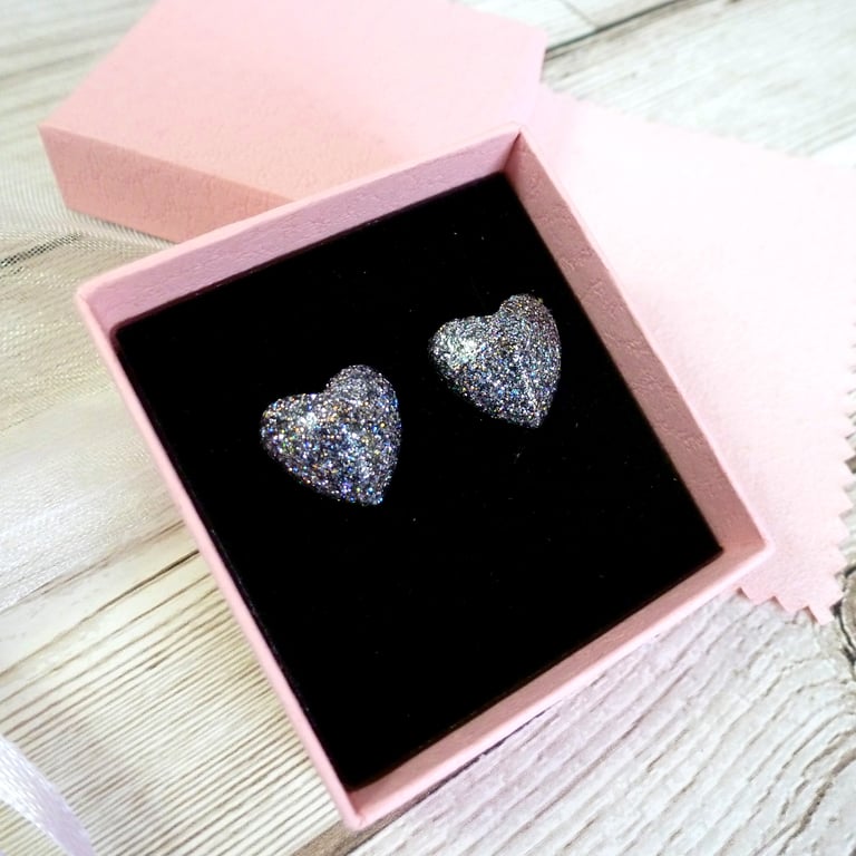 Holographic silver heart stud earrings. Sparkly silver glitter heart studs