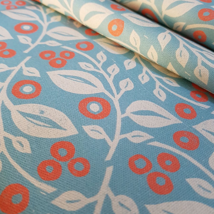 'Lucy' fabric in blue and coral.