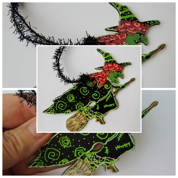 Flying Witch ornament by Kat Hazelton, black and green cape and dress. 