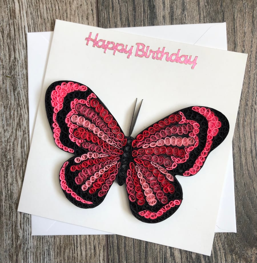 Handmade pink butterfly quilled card