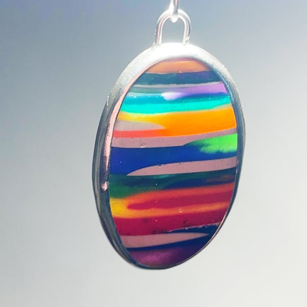Resin and sterling silver hand carved pendant