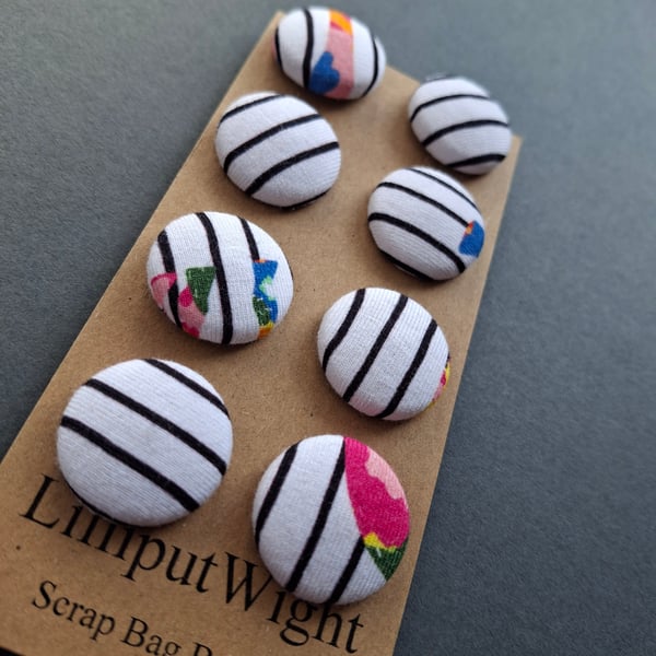 Set of eight scrap bag buttons - black and white stripe with colour splashes