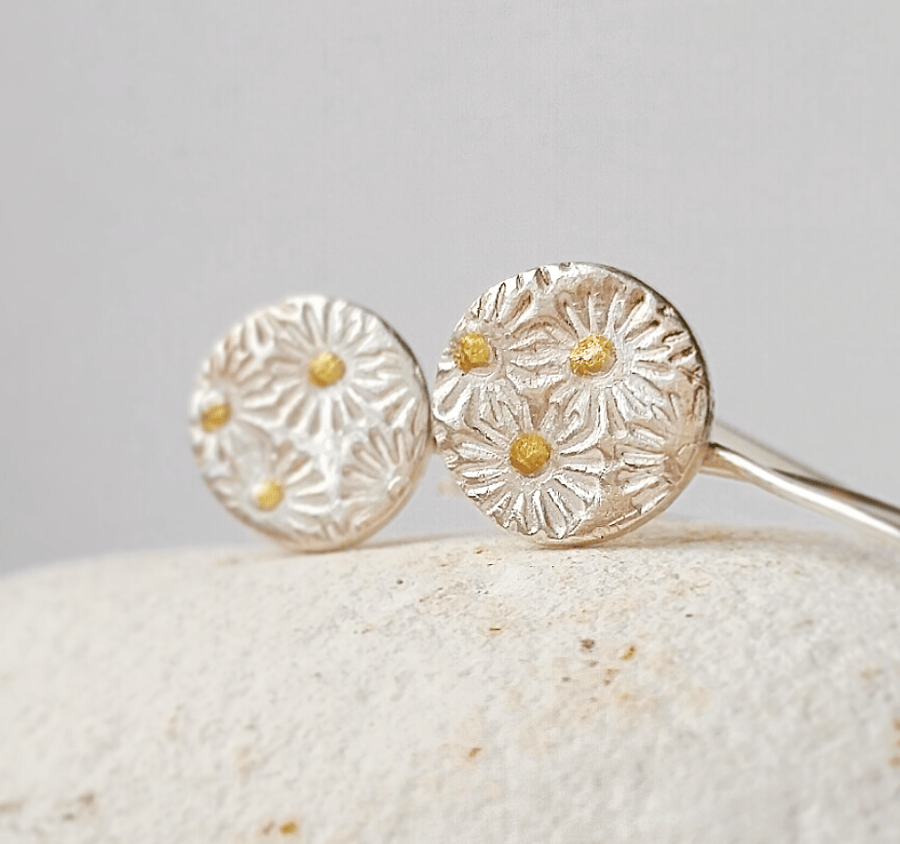 Silver round Drop Earrings with flower texture .