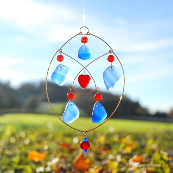 Blue sun catcher with red heart