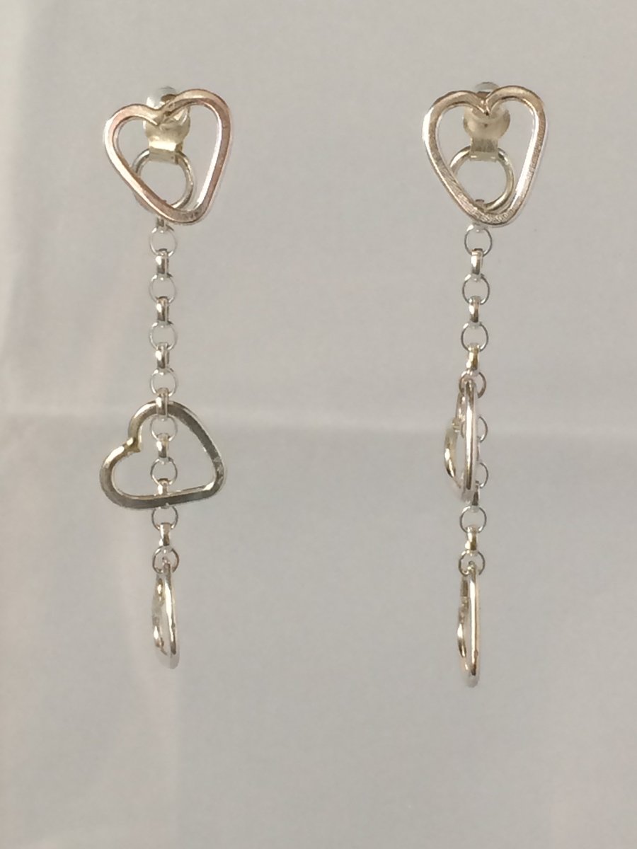 Three heart earrings