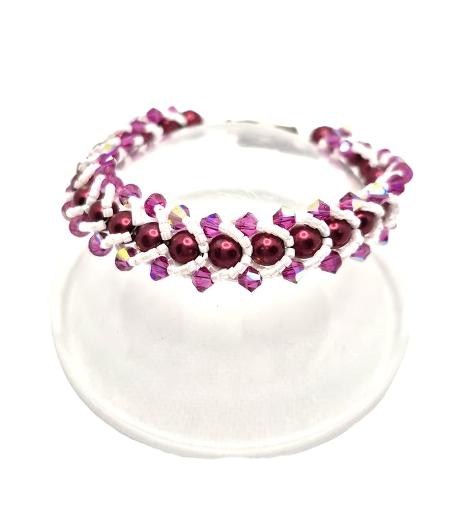 Flat spiral bracelet with red Swarovski pearls and pink AB Swarovski crystals