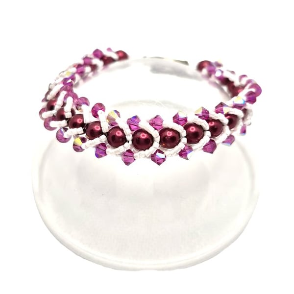 Flat spiral bracelet with red Swarovski pearls and pink AB Swarovski crystals
