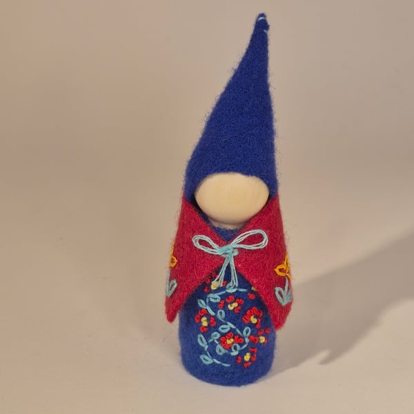 Large gnome with floral embroidery