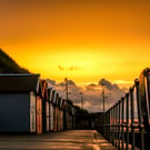Coastal Photography - Beach Hut Sunset - Mounted Photograph