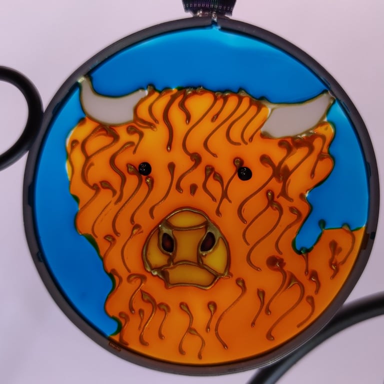 Handmade glass painted window hanging or Christmas tree bauble