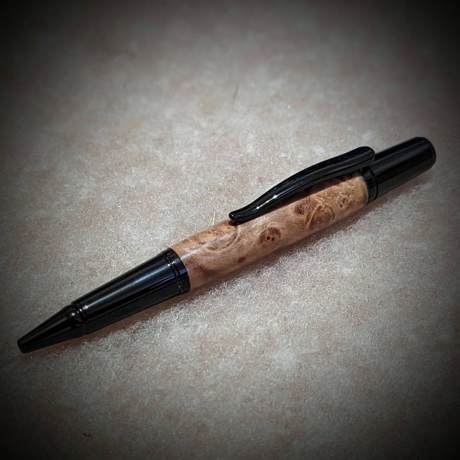 Handmade maple burl wooden ballpoint pen with black fittings - premium hardwood.