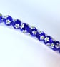 Handmade blue and white daisy patterned lamp work glass beads - Image 9