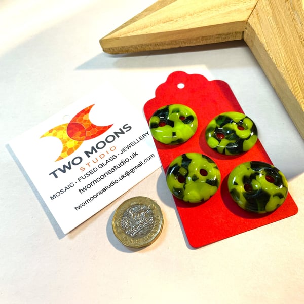 Set of 4 green glass buttons. 