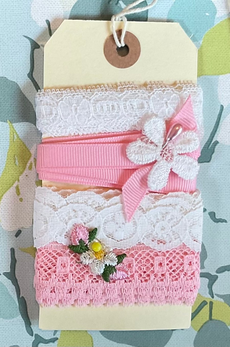 Vintage trim lace ribbon etc on a tag! Lovely gift ….with surprise freebie!