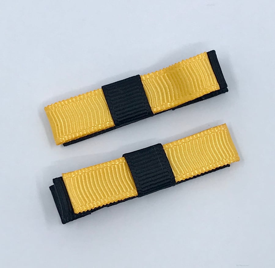 Small Straight Black and Yellow Gold Bow Clips (pair)