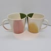 Large hand thrown porcelain stoneware mugs pink, green and yellow glaze