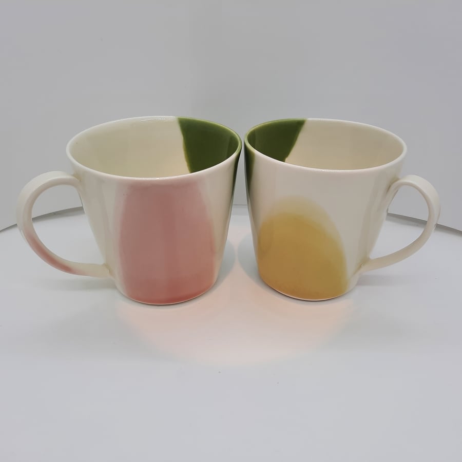 Large hand thrown porcelain stoneware mugs pink, green and yellow glaze