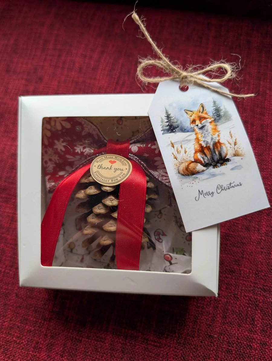 Handmade Christmas decorations pine cone with bow