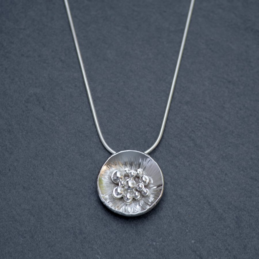 Silver granulated pendant