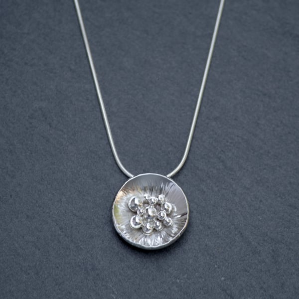 Silver granulated pendant