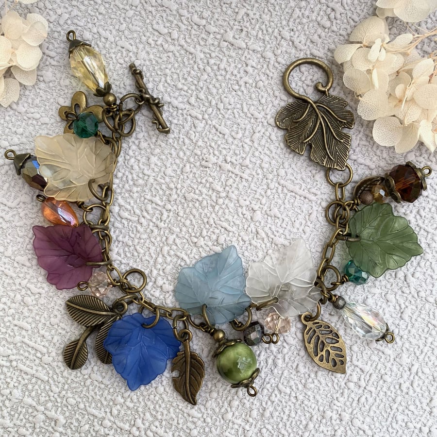 Antique Bronze, Lucite and Glass Bead Charm Bracelet 