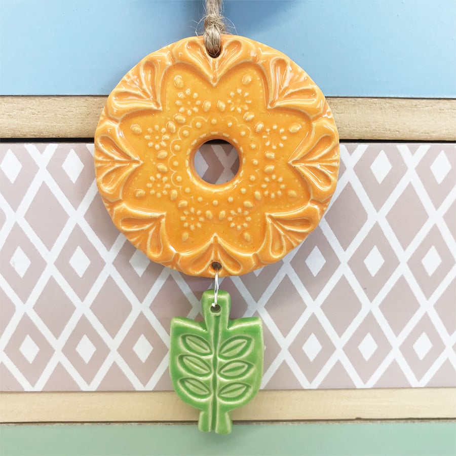 Retro style pottery hanging flower decoration orange