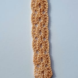 Crocheted lace bookmark,  pale peach.