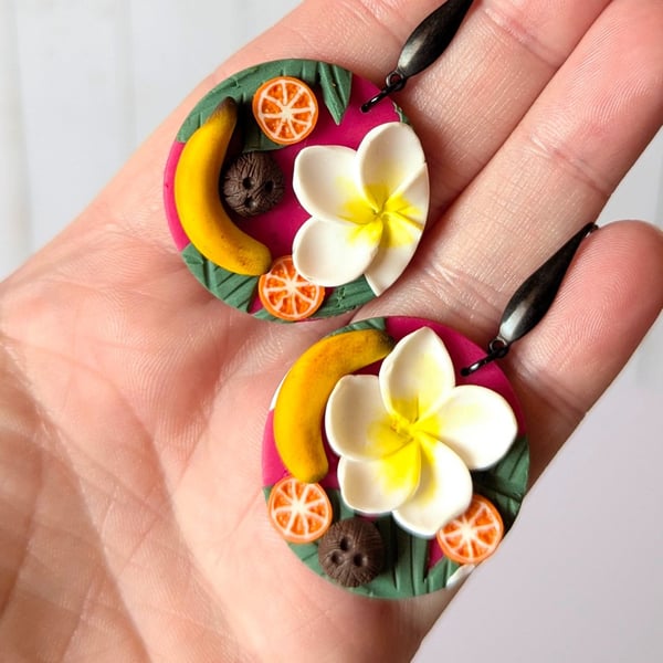 Tropical frangipani dangle earrings.