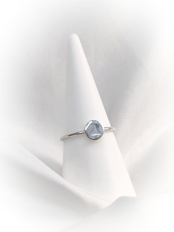 Sterling silver ring with forged disc