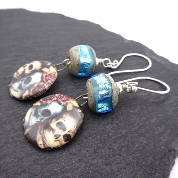 blue sparkly lampwork glass skull earrings