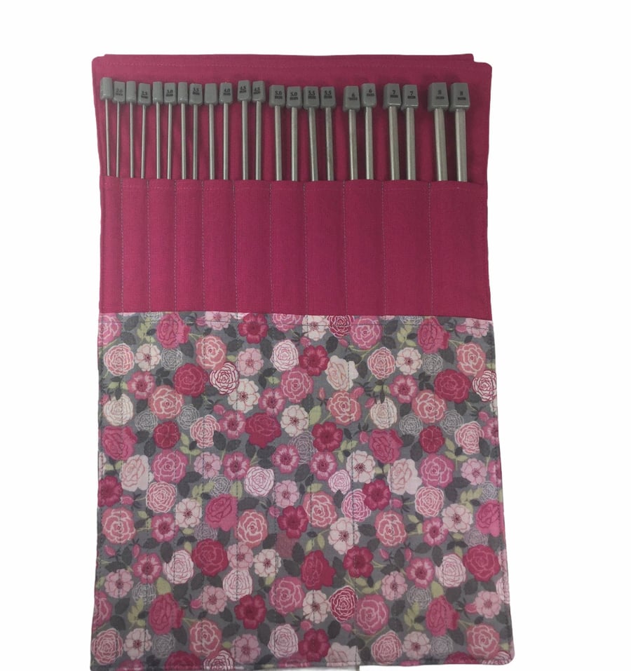 Full set of metal knitting needles in a case with pink floral rose print, straig