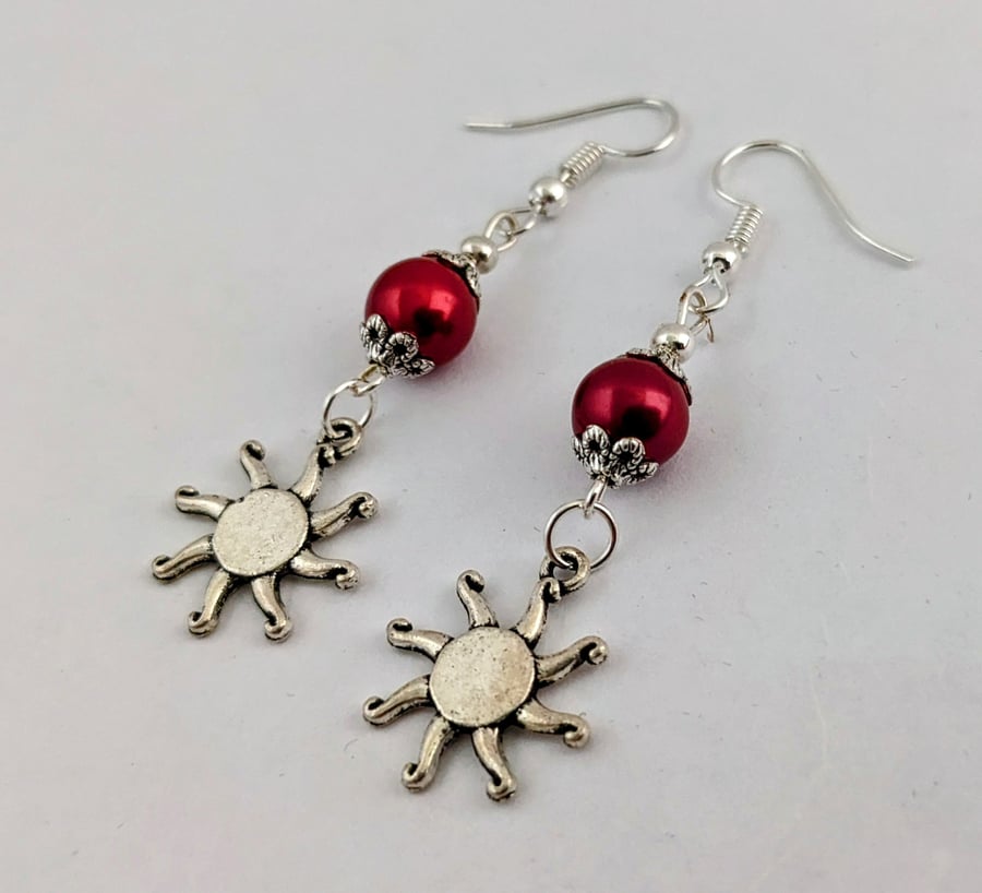 Dark red and silver sunburst earrings