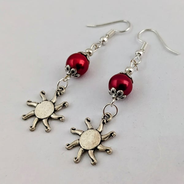 Dark red and silver sunburst earrings