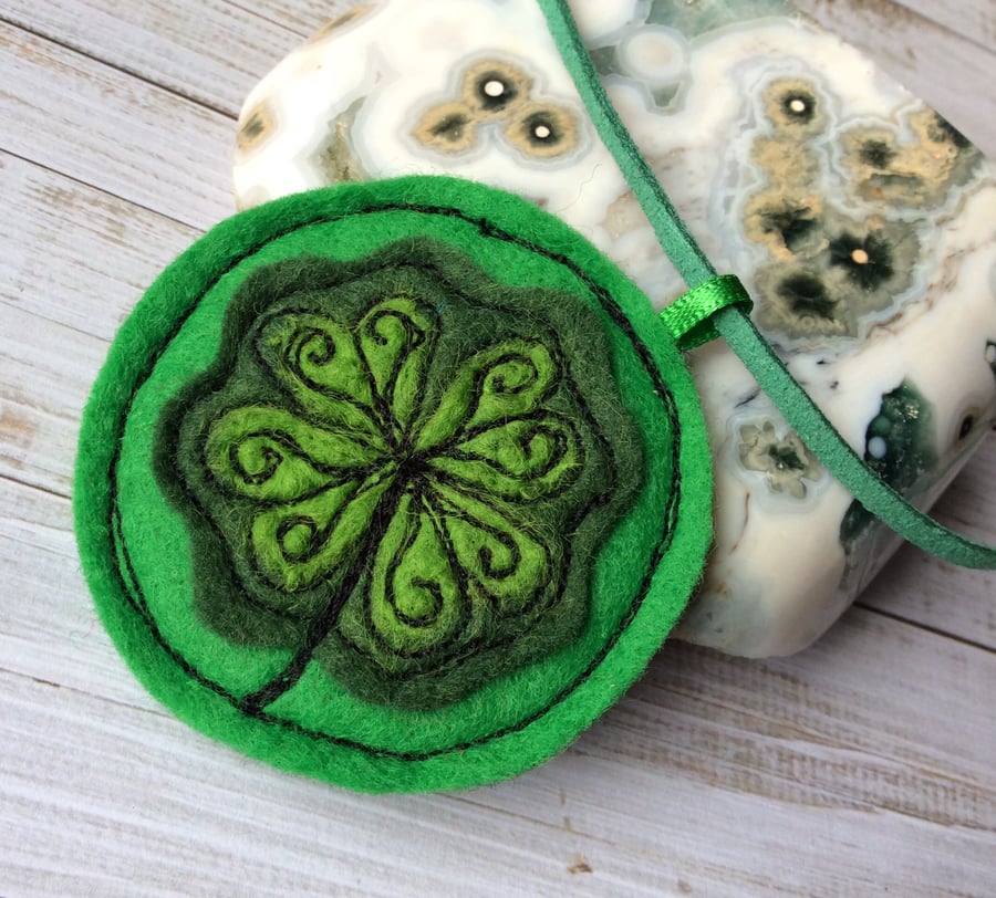 Handmade needle felted four leaf clover necklace.
