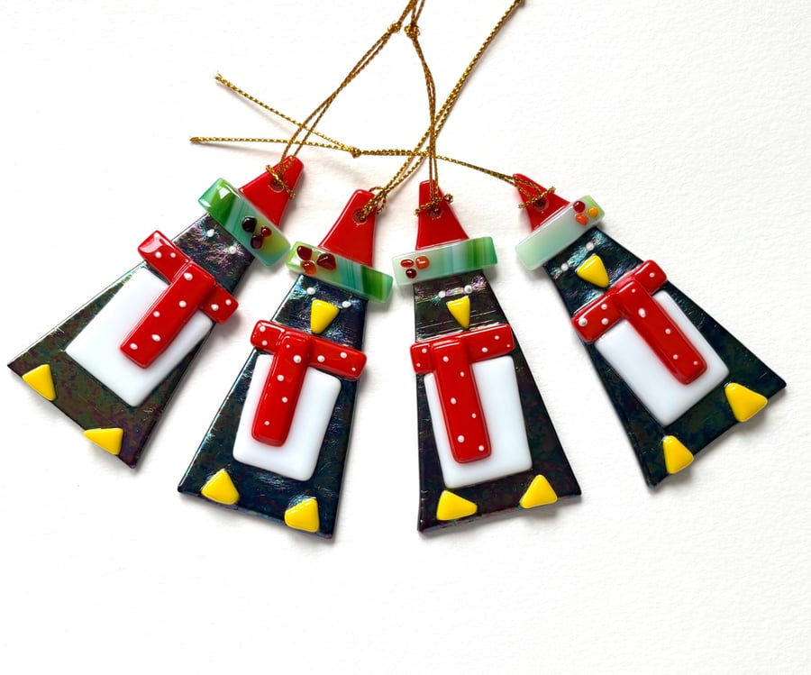 Luminescent glass penguins