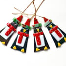 Luminescent glass penguins