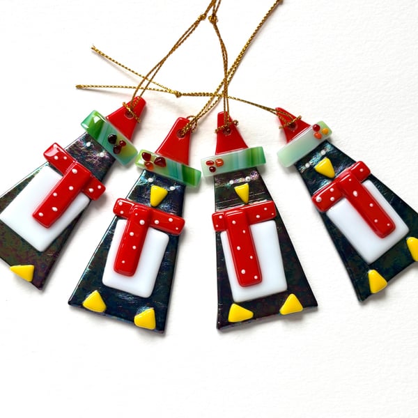 Luminescent glass penguins