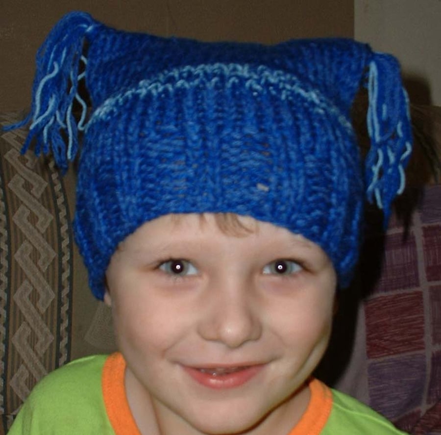 Knitted 2 tassel square hat. Suits Baby or young child