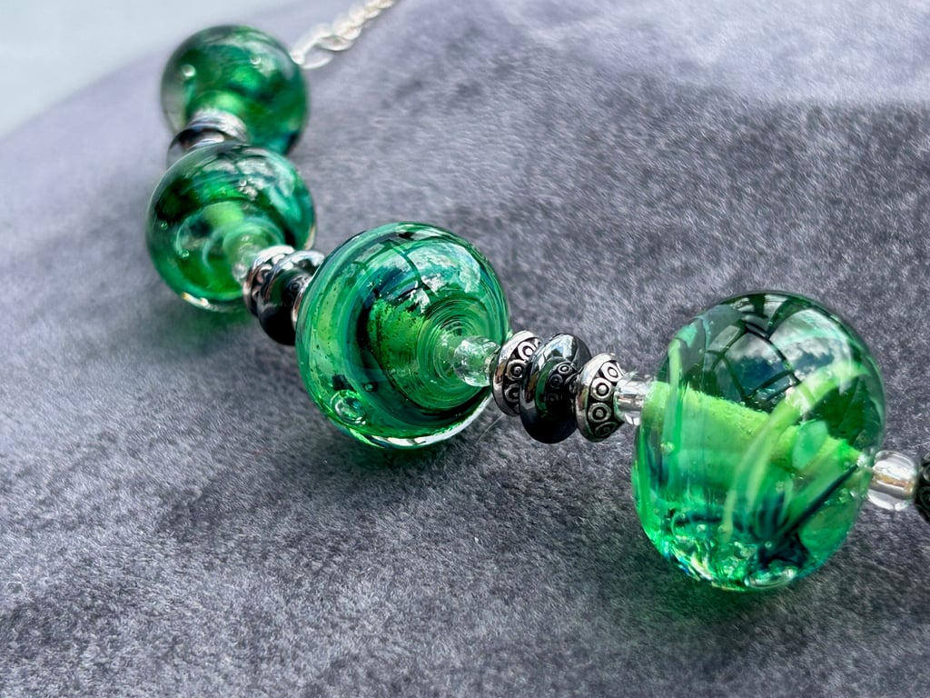 green swirly and sparkly handmade lampwork glass necklace