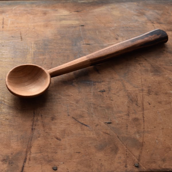 Hand carved wooden spoon with ebonised handle