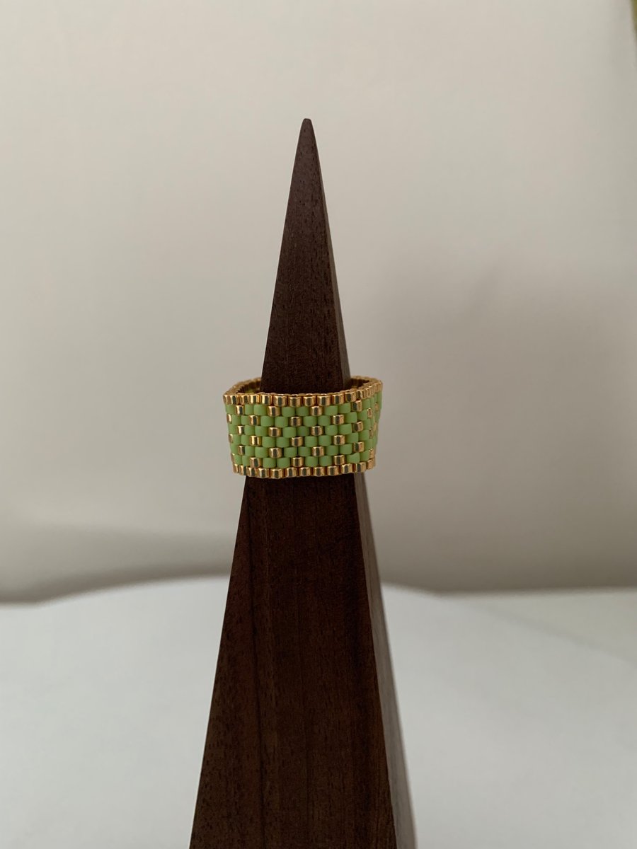 Vibrant green and gold beaded ring